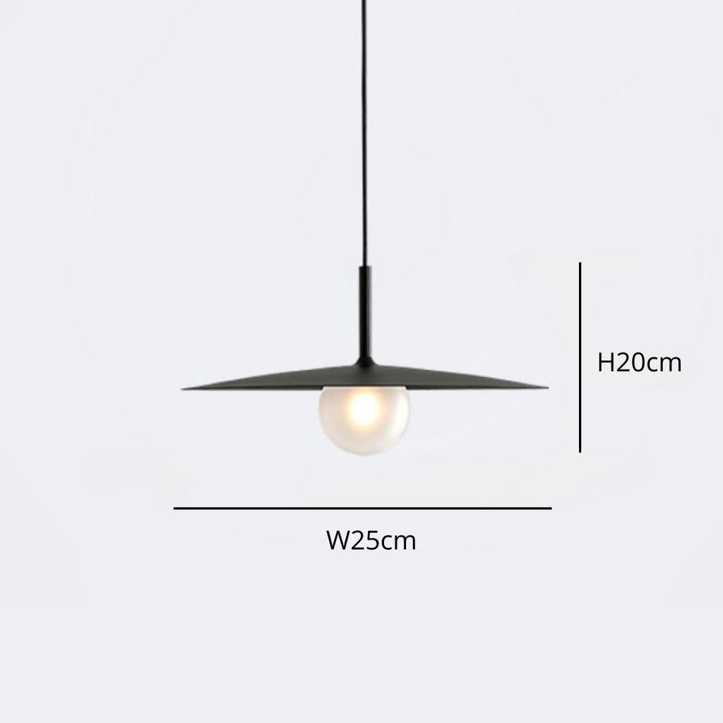 Minimalist pendant light with a wide, flat black shade and a round bulb underneath. Dimensions are labeled: height 20 cm and width 25 cm. The lamp hangs from a thin black cord.