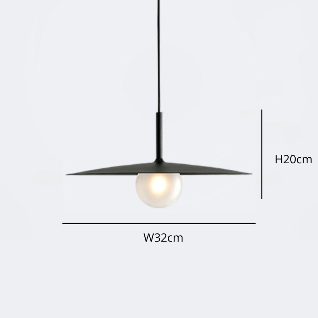 Minimalist black pendant light with a flat, circular shade and a round bulb underneath. Labeled dimensions: width 32cm and height 20cm, shown on a plain light gray background.