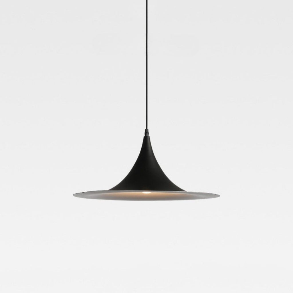 Minimalist black pendant light with a cone-shaped top and wide, flat bottom, suspended by a thin cord against a plain white background.