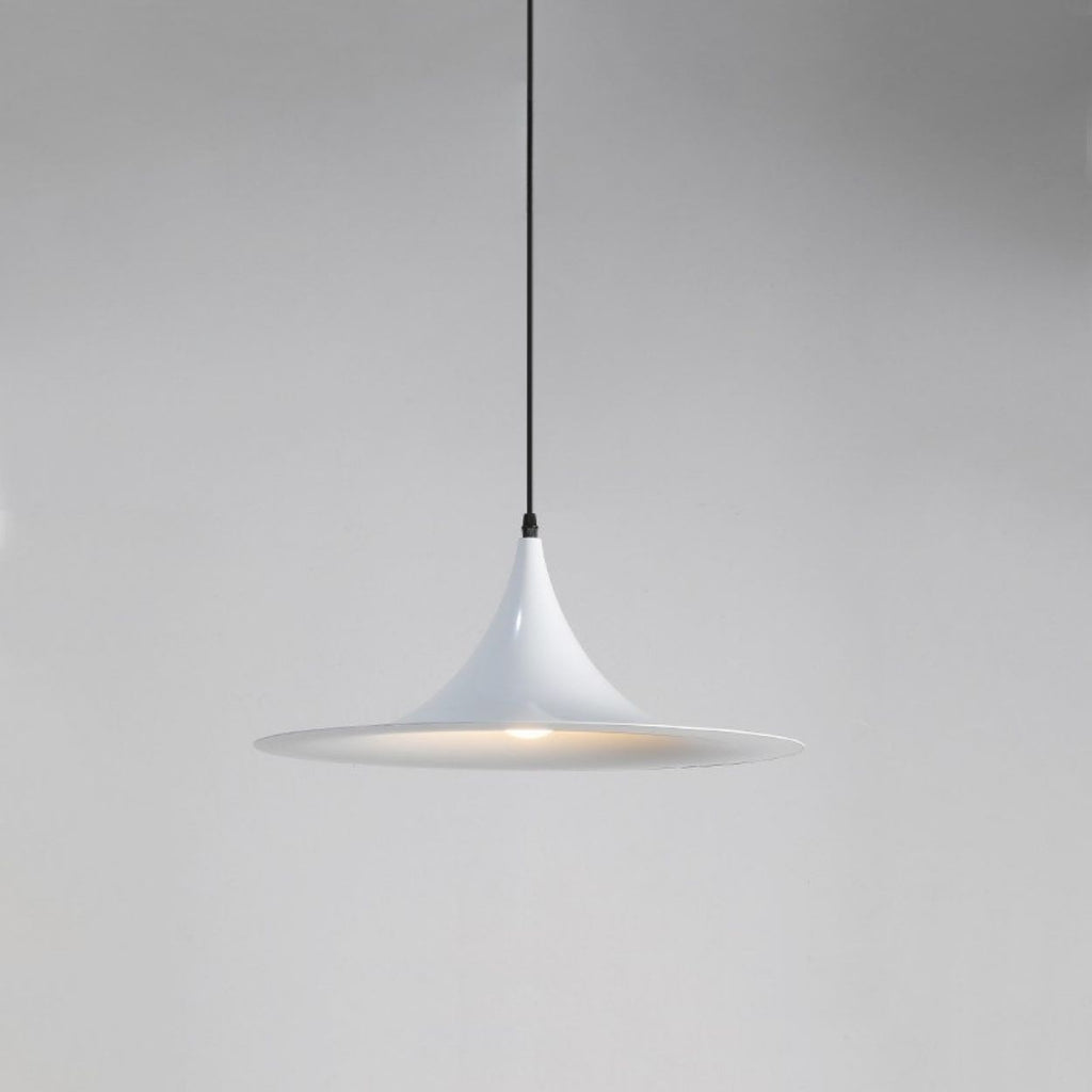 A modern, white pendant light with a sleek, cone-shaped shade hangs from a thin black cord against a plain gray background.
