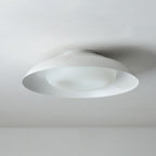 A modern, round ceiling light with a smooth, minimalist design, seamlessly mounted on a white ceiling.