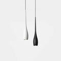 Two modern pendant lights with slim, elongated shapes hang side by side against a plain white background; one pendant light is white and the other is black.