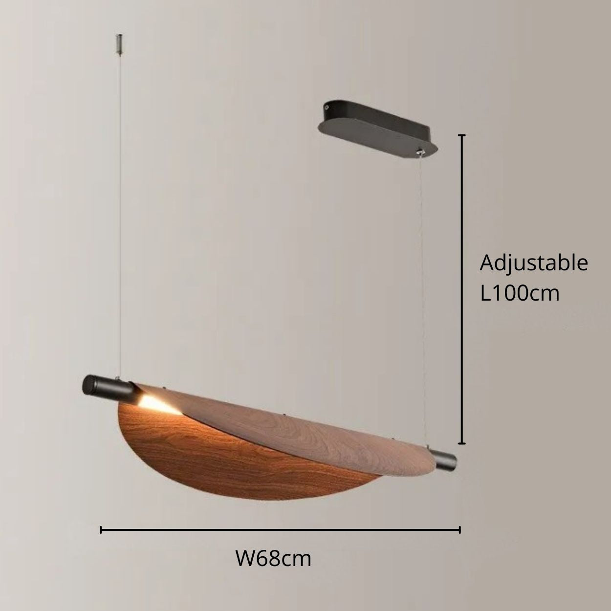 A modern chandelier pendant light with a curved wooden shade, suspended by two wires from a rectangular black ceiling mount. The shade is 68cm wide and height adjustable up to 100cm. The light emits a warm glow.