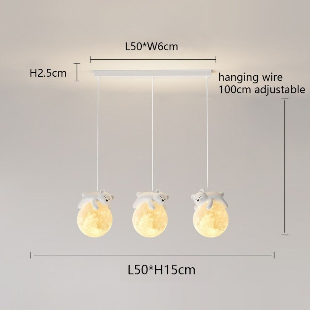 Three pendant lights shaped like glowing moons, each with a small bear figure hugging the top. These charming pendant lights hang from a rectangular ceiling mount, with dimensions and adjustable hanging wire measurements provided.